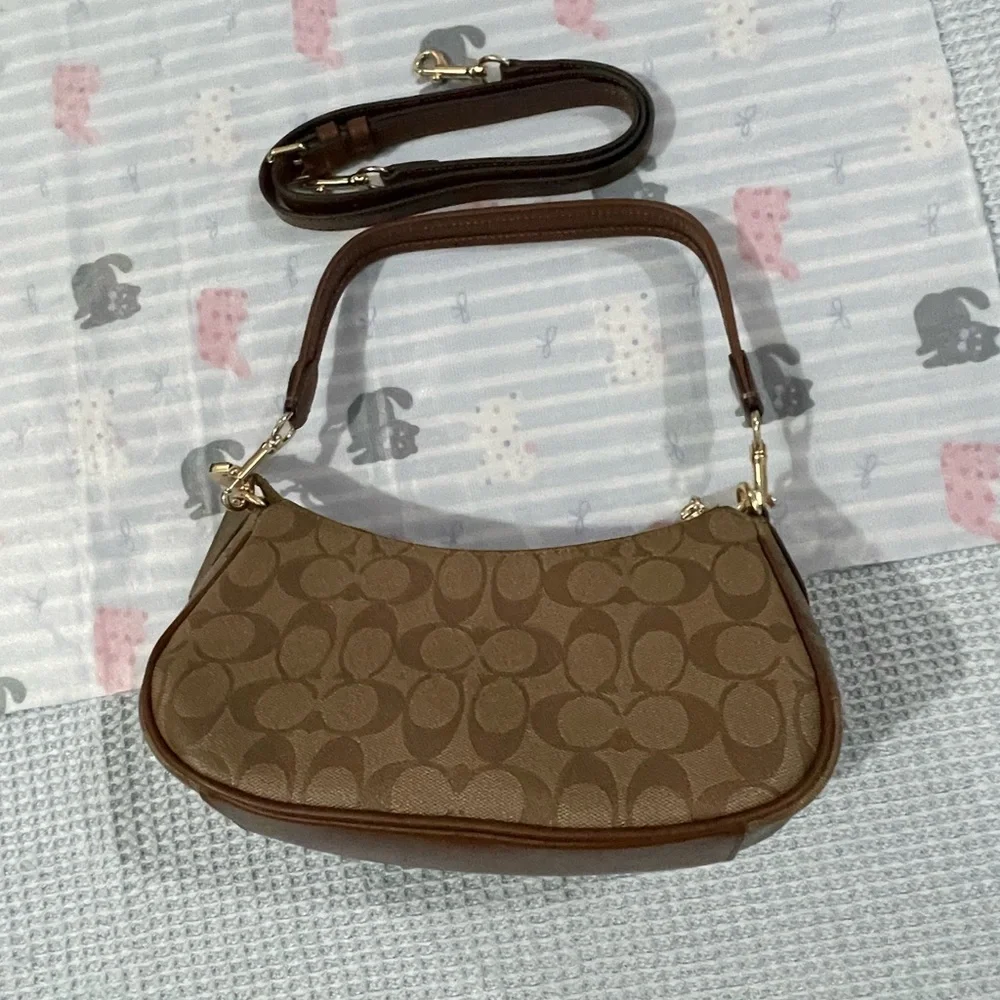Coach Brown Signature Canvas Shoulder Bag with Double Buckle Pockets